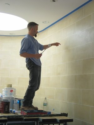 Adrian Card, decorative painter, in his studio